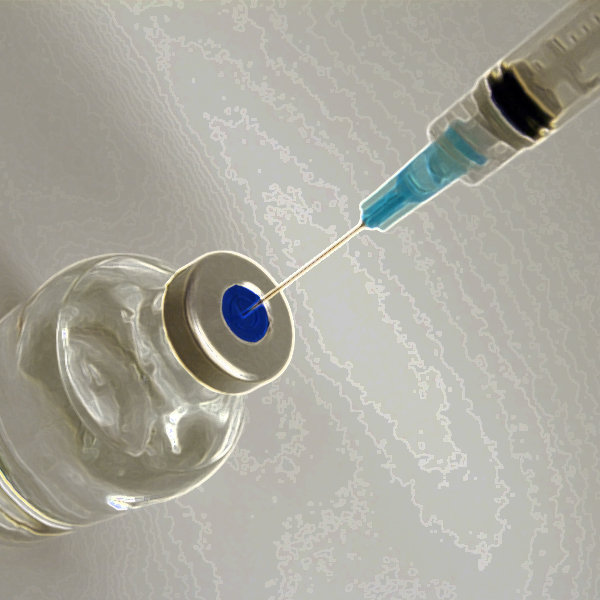 Vaccine needle and vial, photo © FreeImages/Brian Hoskins