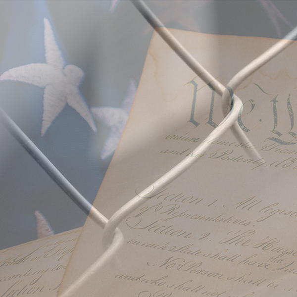 A prison fence hovers over the U.S. Constitution. (Photos © Constitutional Accountability Center and FreeImages/Jonathon Hayward)