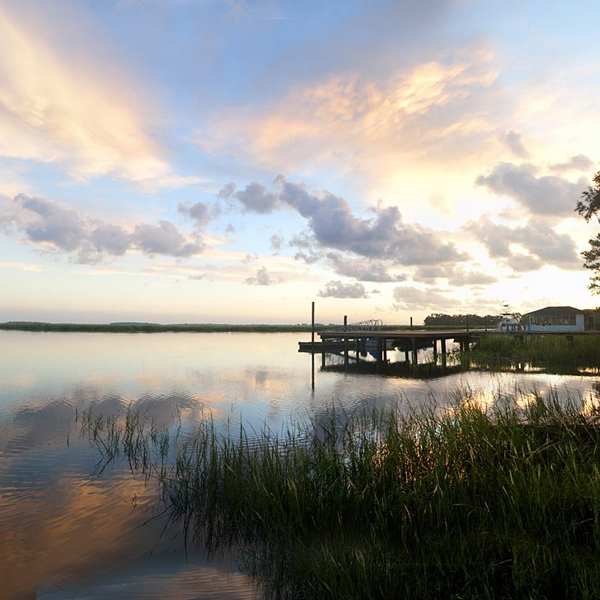 A dock extends into the Low Country marsh. (Photos © FreeImages/Roger Kirby)